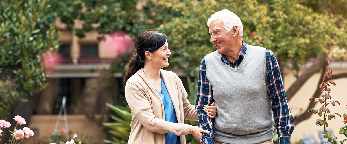 nursing homes near morrisville ny long term care image of elderly man and nurse smiling outside