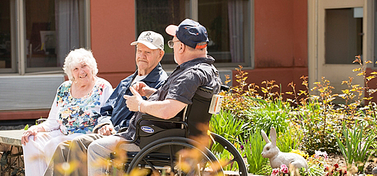 long term care near morrisville ny image of senior citizens talking outside