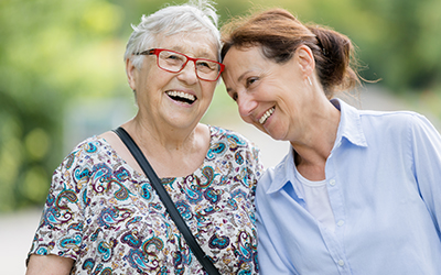 palliative care taking a walk with senior citizen